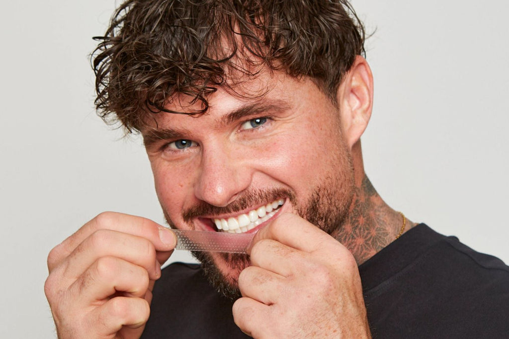 Icy Bear Model holding teeth whitening strips for Black Friday sale